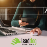 A girl with a laptop and tablet working for Lead Dog Digital in Tyler, TX - experts in SEO, digital marketing, and web design.